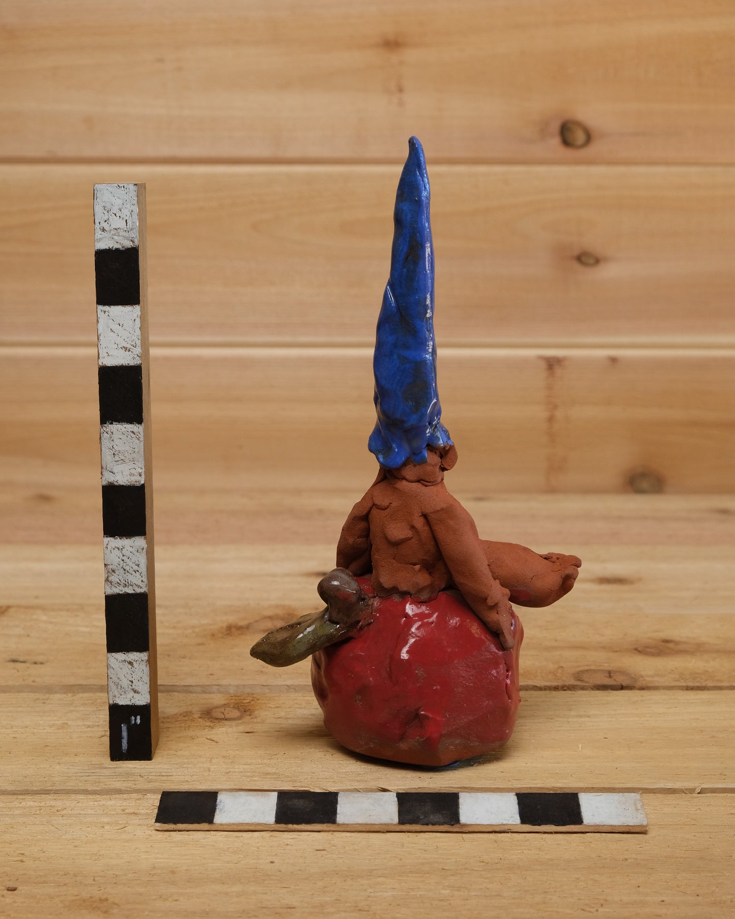 Gnome Sitting on Apple