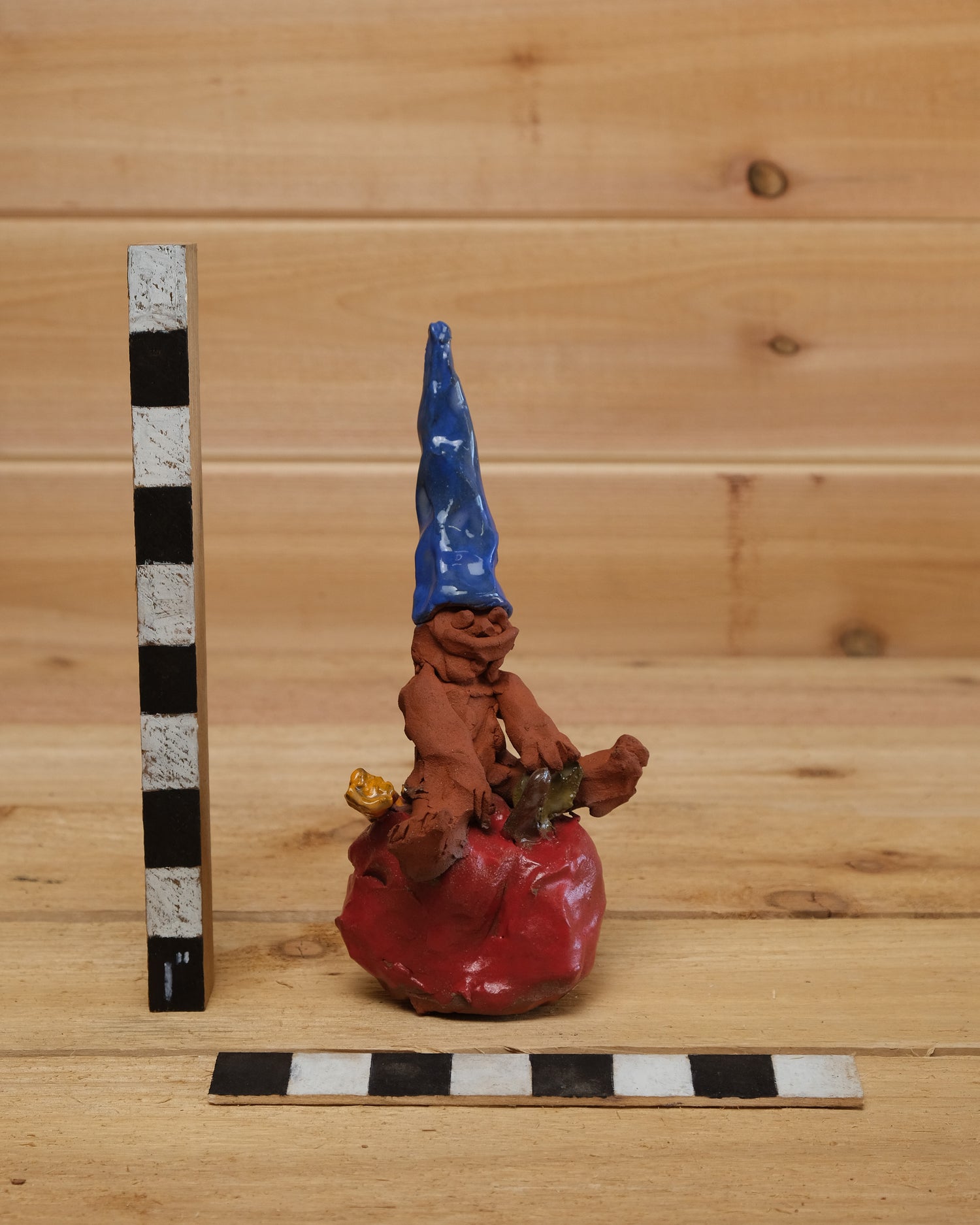 Gnome on Worm-Inhabited Apple