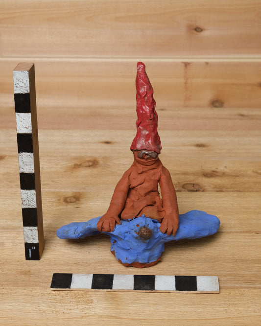 Gnome Flying on Blue Bird